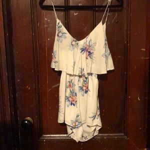 White romper with flowers on it